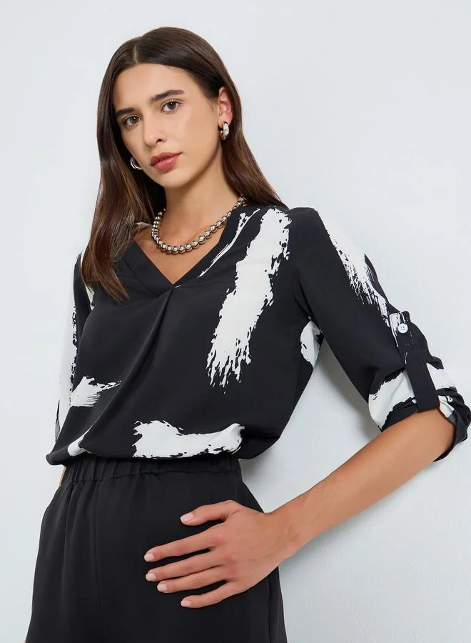 تايك تو بلوزة بطباعة وأكمام قابلة للطي